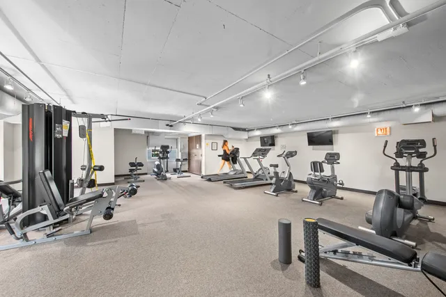 a view of a room with gym equipment