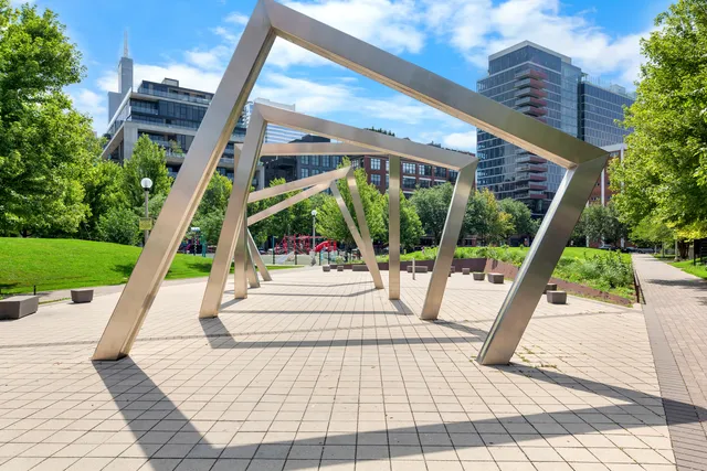 a view of a patio with a table and chairs