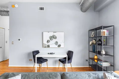 a view of a workspace with furniture