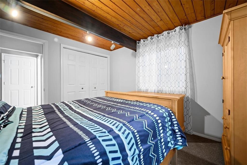 228 Foxglove Road Baden, PA 15005 - Photo 12 of 25 a bedroom with a bed and a window