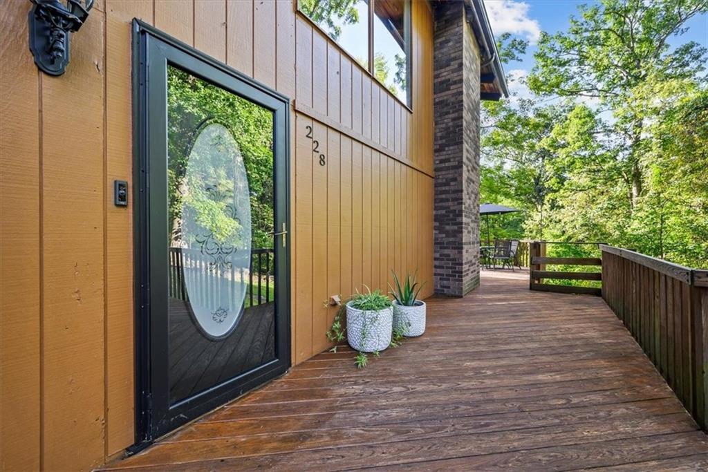 228 Foxglove Road Baden, PA 15005 - Photo 2 of 25 a view of a garden with wooden floor