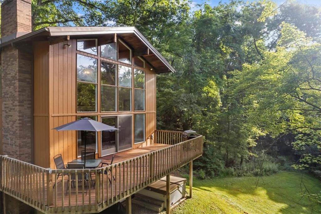 228 Foxglove Road Baden, PA 15005 - Photo 23 of 25 a view of a roof deck with chair and wooden floor