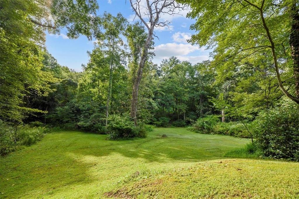 228 Foxglove Road Baden, PA 15005 - Photo 24 of 25 a view of a garden with a building