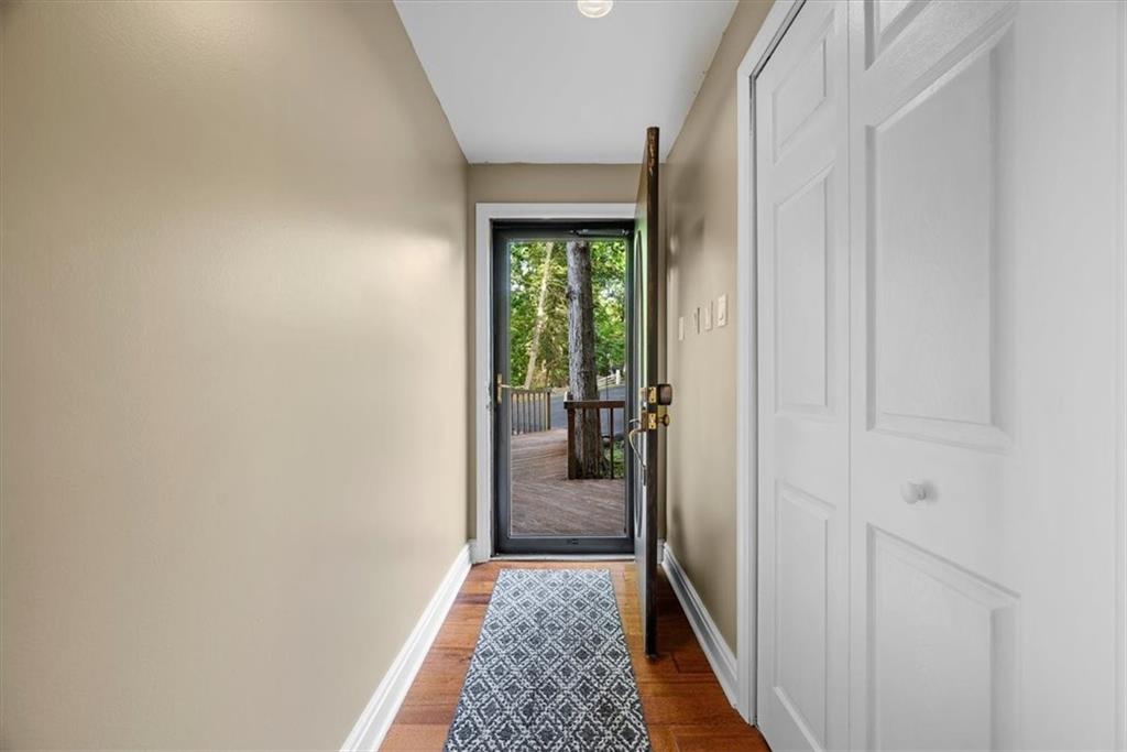 228 Foxglove Road Baden, PA 15005 - Photo 3 of 25 a view of hallway with wooden floor