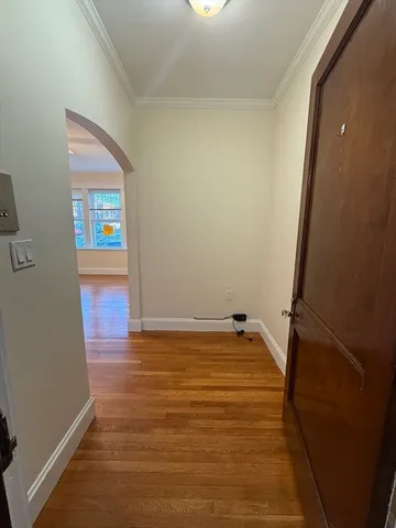 a view of an empty room and window