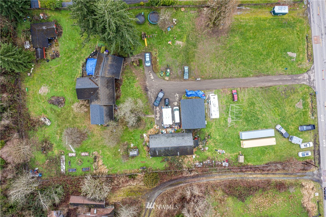 24125 7th Avenue Southeast Bothell, WA 98021 - Photo 11 of 18 an aerial view of a house with a garden and lake view