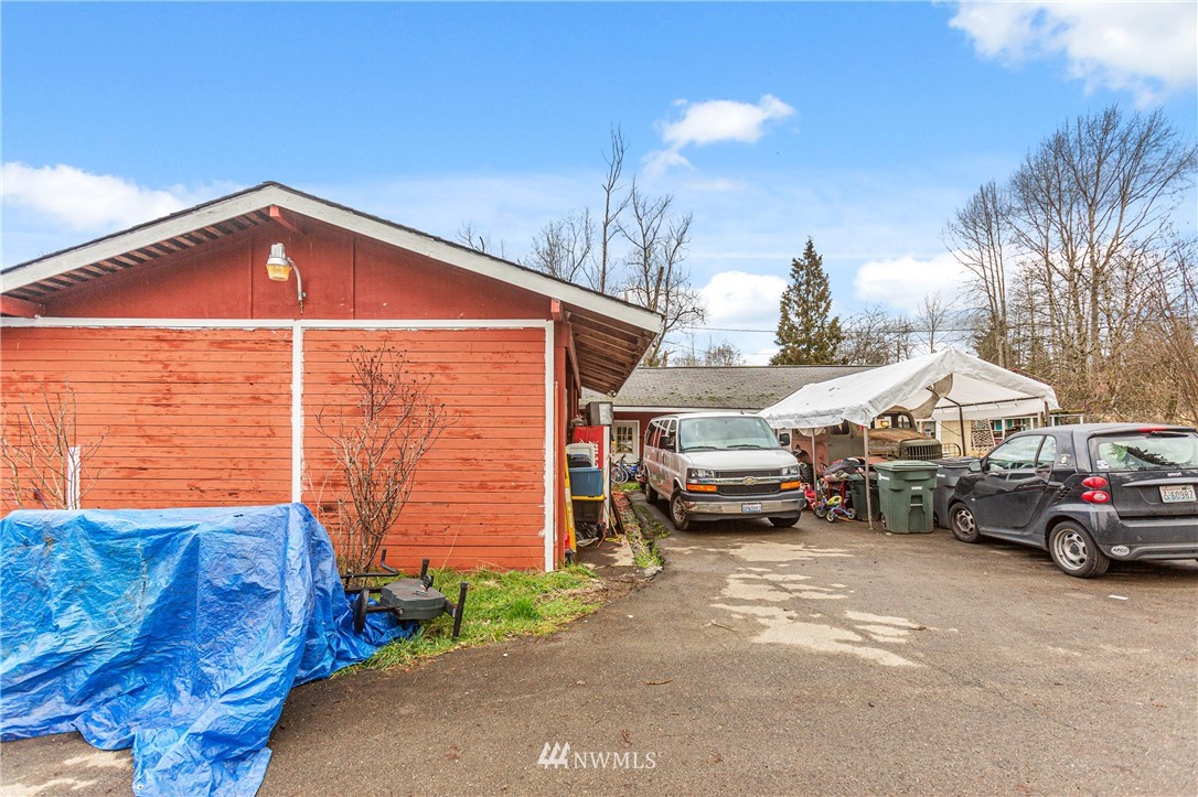 24125 7th Avenue Southeast Bothell, WA 98021 - Photo 12 of 18 a front view of a house with parking space
