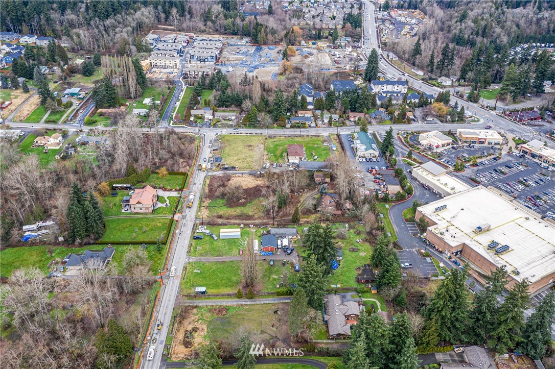 24125 7th Avenue Southeast Bothell, WA 98021 - Photo 5 of 18 an aerial view of a house with a garden and lake view
