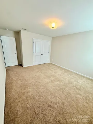 a utility room with cabinets