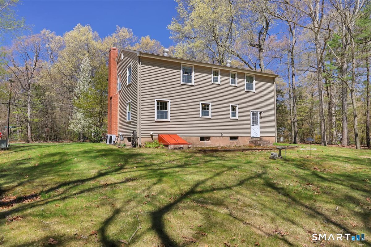 40 Wappingwood Road Ellington, CT 06029 - Photo 26 of 31 As you walk outside and take a look at all this home has to offer with a beautiful backyard with plenty of room to transform into the space of your dreams!