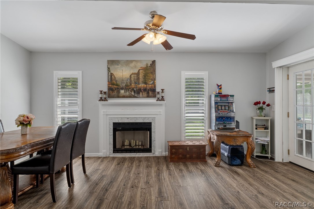 1140 South Highlands Avenue Inverness, FL 34452 - Photo 18 of 54 a living room with furniture and a fireplace