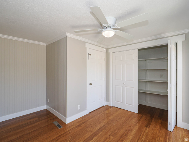 154 East 3000th Street South Bountiful, UT 84010 - Photo 12 of 37 Room featuring wood-finish flooring, a ceiling fan with integrated lighting, and crown molding