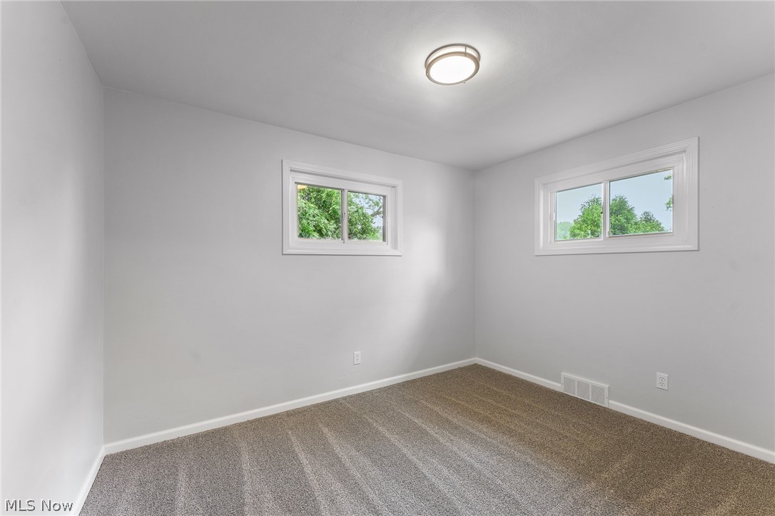 962 Keefer Road Girard, OH 44420 - Photo 19 of 31 Empty room featuring carpet flooring
