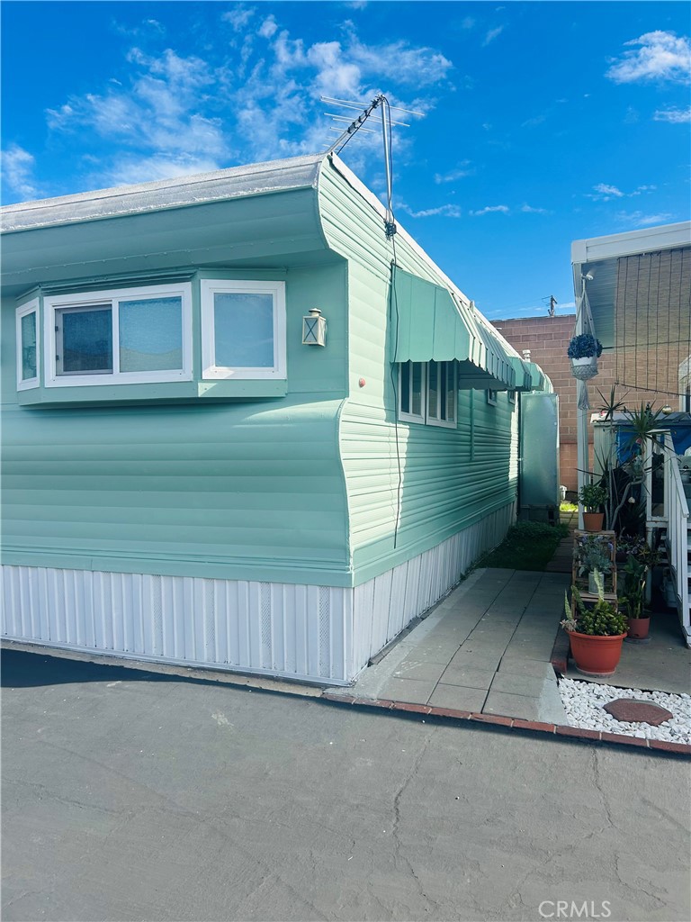 1436 West 130th Street Gardena, CA 90249 - Photo 4 of 13 a view of a house with a patio