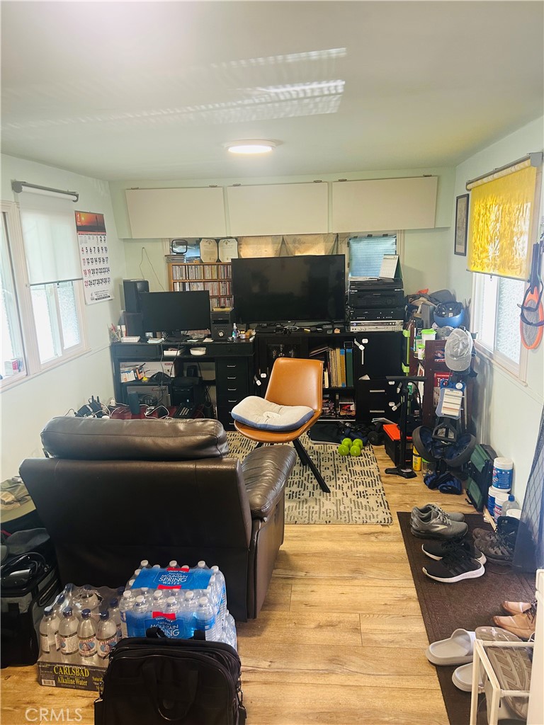 1436 West 130th Street Gardena, CA 90249 - Photo 5 of 13 a living room with furniture and a wooden floor
