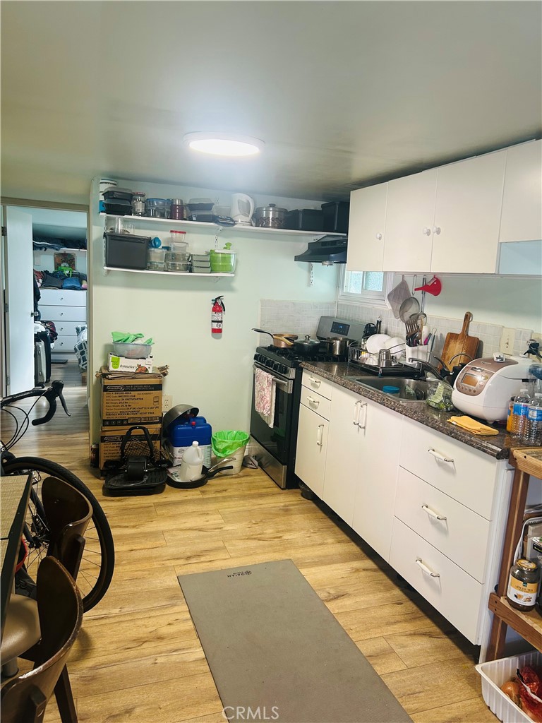 1436 West 130th Street Gardena, CA 90249 - Photo 6 of 13 a room with storage and utility