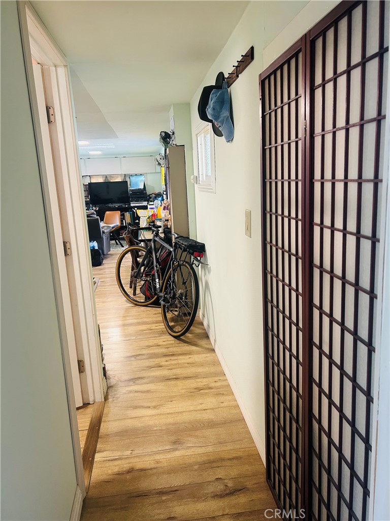 1436 West 130th Street Gardena, CA 90249 - Photo 7 of 13 a view of a room with wooden floor