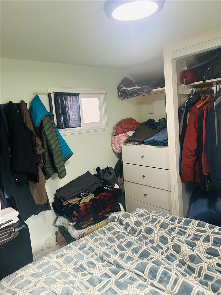 1436 West 130th Street Gardena, CA 90249 - Photo 10 of 13 a bedroom with a bed and a closet