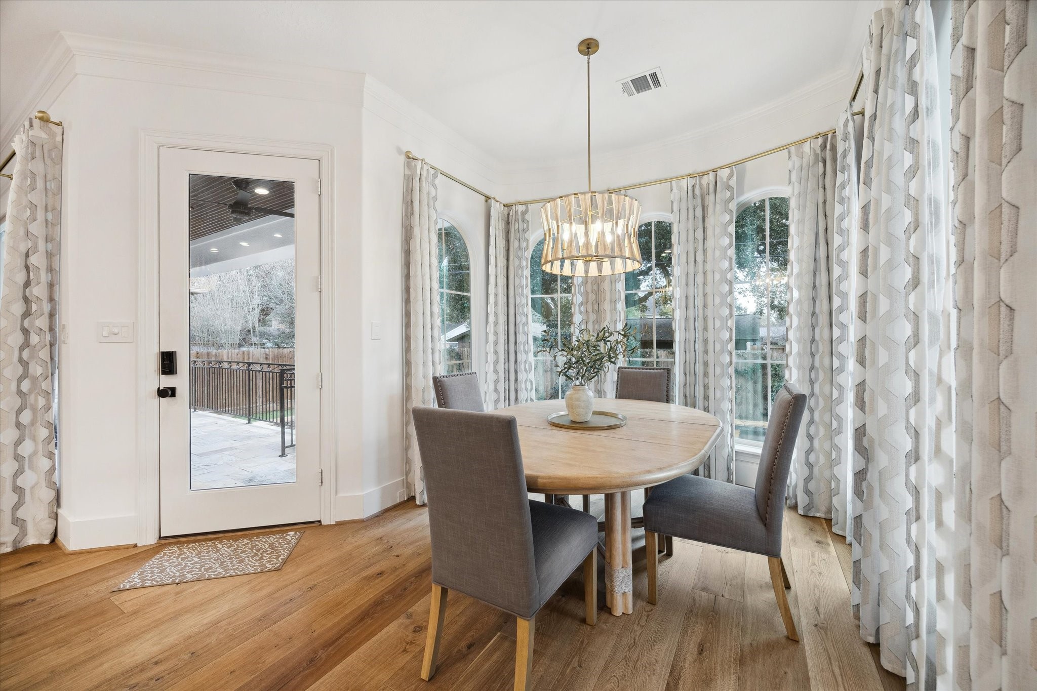 3615 Durness Way Houston, TX 77025 - Photo 19 of 46 a view of a dining room with furniture window and wooden floor