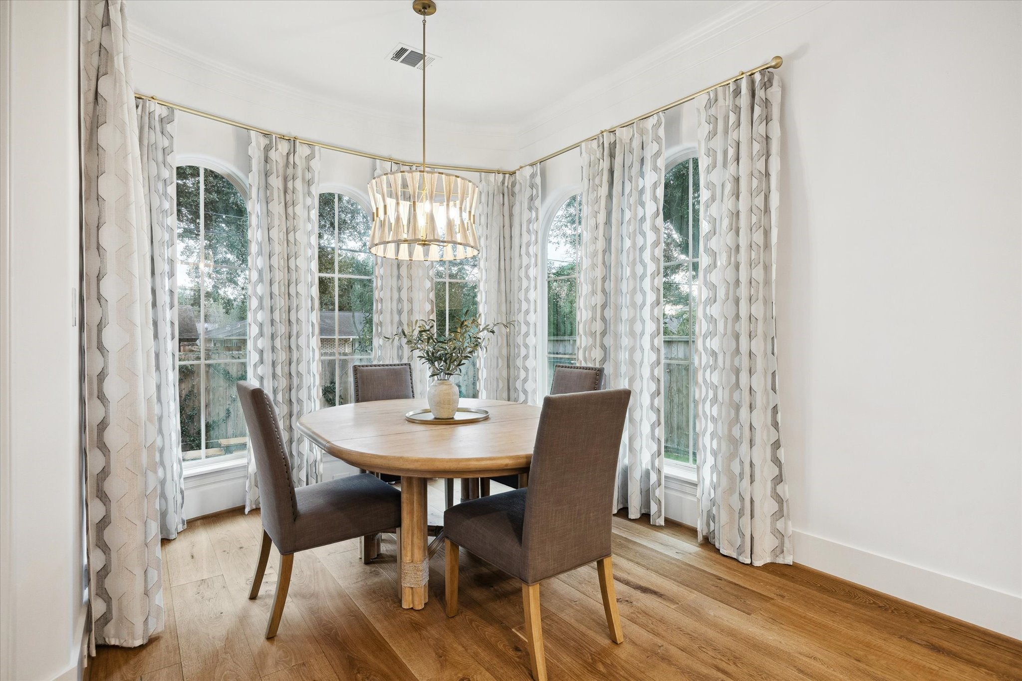 3615 Durness Way Houston, TX 77025 - Photo 20 of 46 a view of a dining room with furniture window and wooden floor