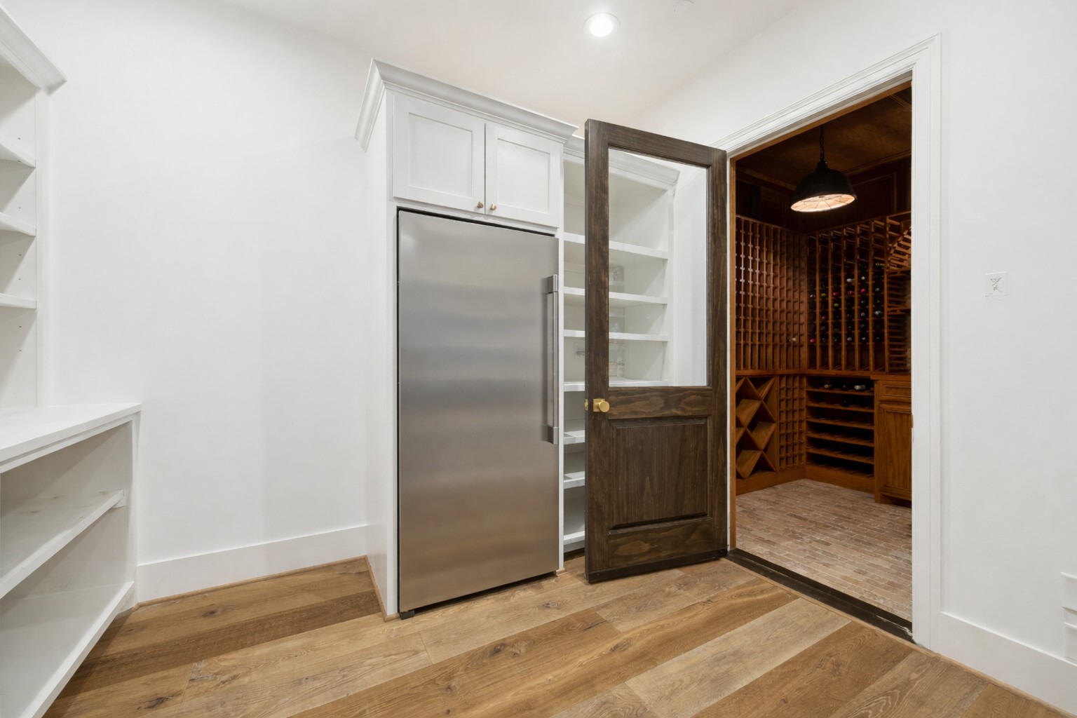 3615 Durness Way Houston, TX 77025 - Photo 21 of 46 a view of an empty room with wooden floor and closet