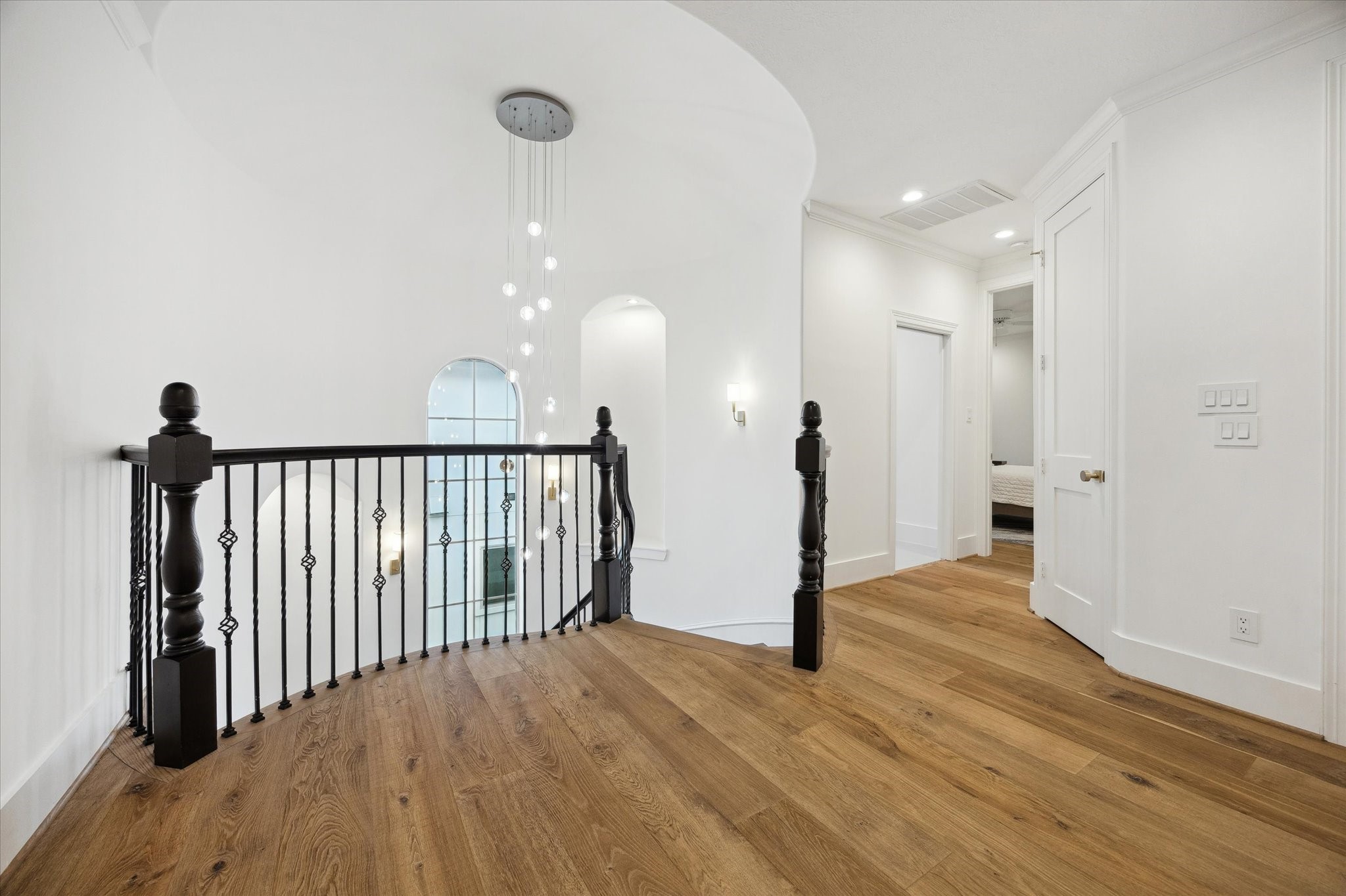 3615 Durness Way Houston, TX 77025 - Photo 25 of 46 a view of a hallway with wooden floor