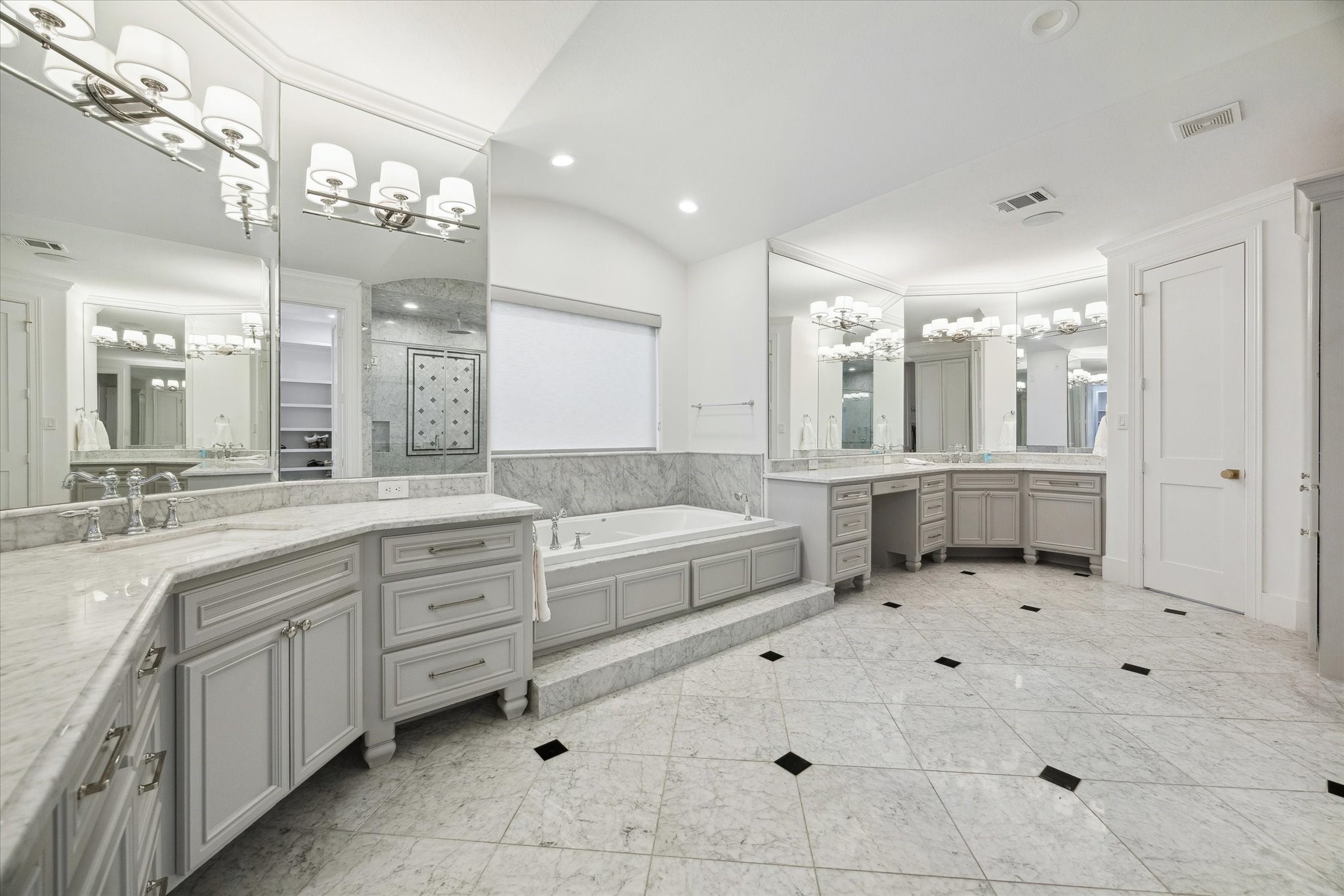 3615 Durness Way Houston, TX 77025 - Photo 36 of 46 a large bathroom with a large tub shower and sink