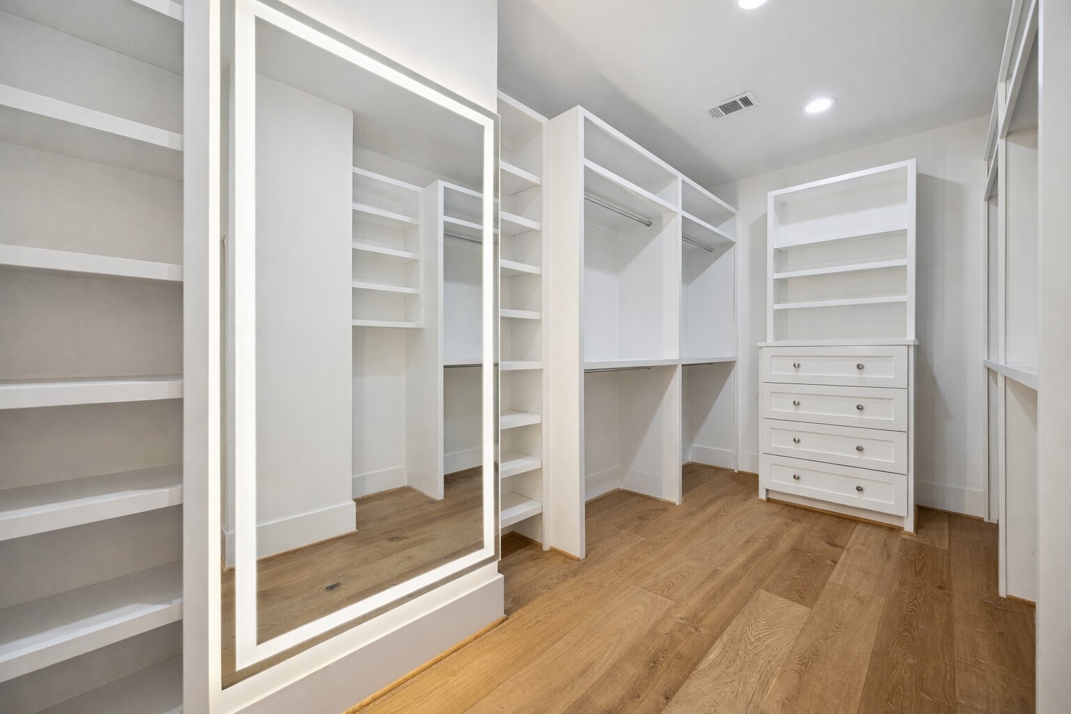 3615 Durness Way Houston, TX 77025 - Photo 40 of 46 a view of walk in closet with empty racks