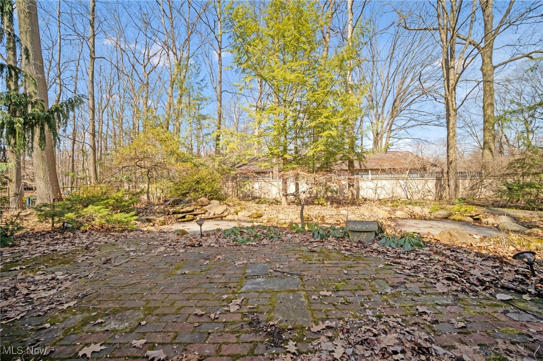 18060 Falling Leaves Road Strongsville, OH 44136 - Photo 40 of 43 View of yard with a patio and fence
