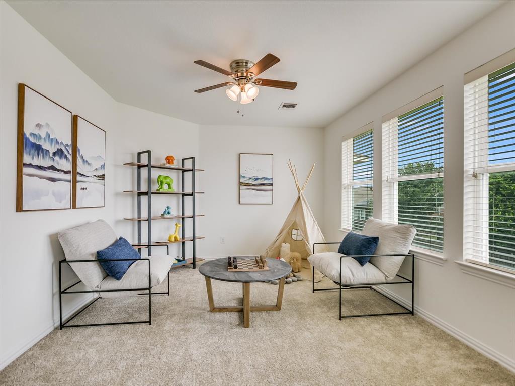 736 Bonnet Boulevard Georgetown, TX 78628 - Photo 11 of 27 a living room with furniture and a window