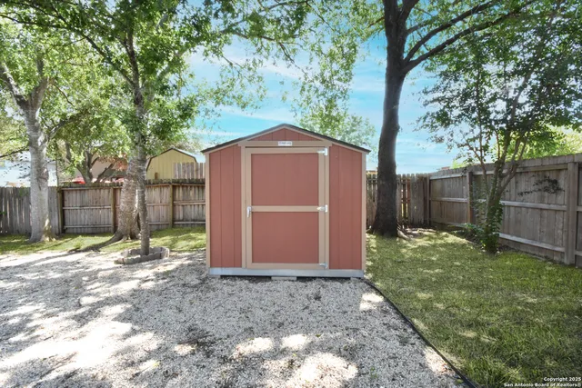 a backyard of a house with lots of green space