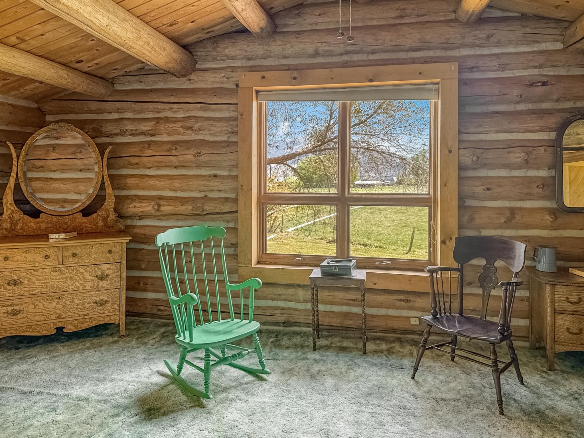 9709 3605 Road Hotchkiss, CO 81419 - Photo 40 of 42 a living room with furniture and a window