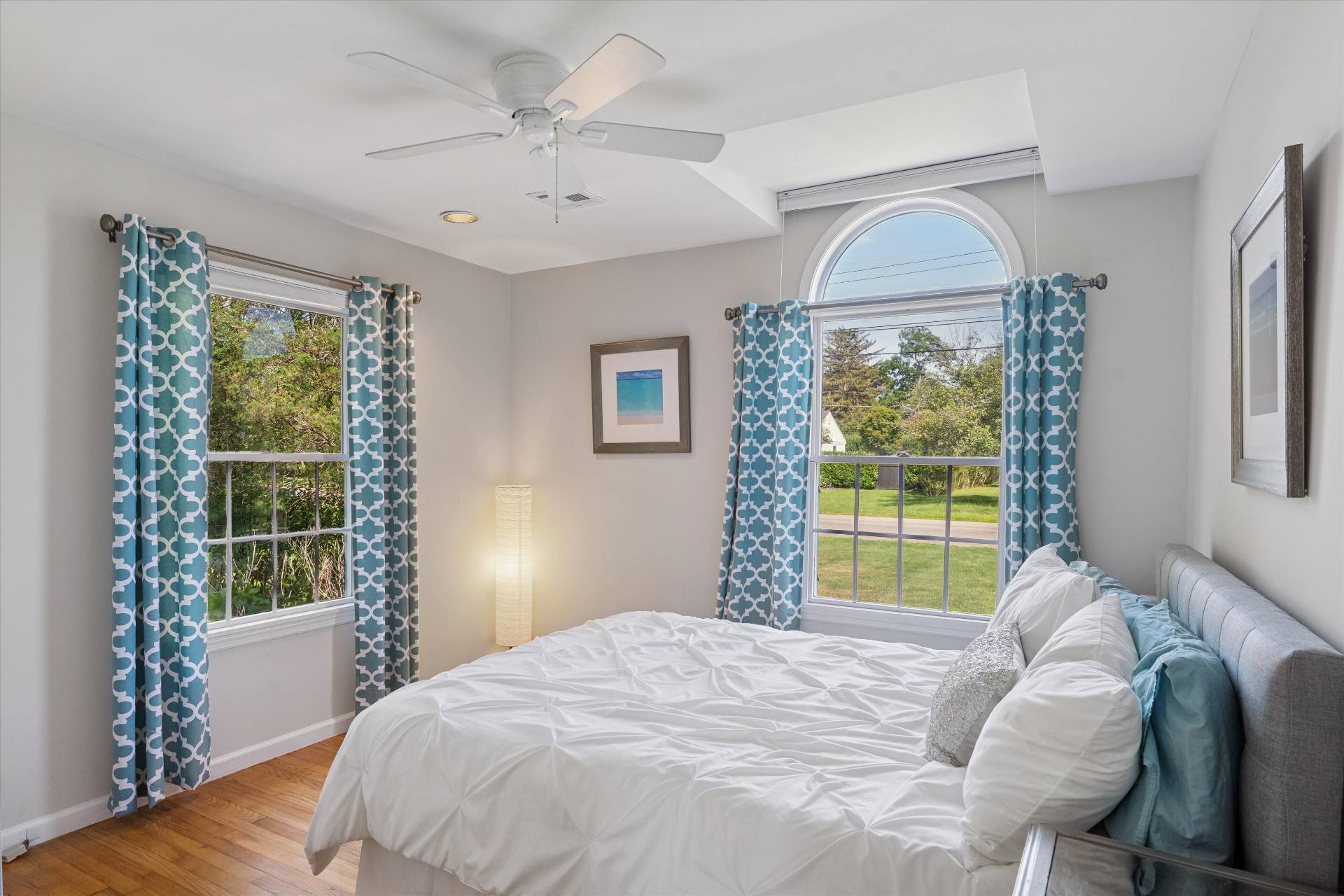 19 Maple Street Westhampton Beach, NY 11978 - Photo 12 of 23 a bedroom with a bed and a window