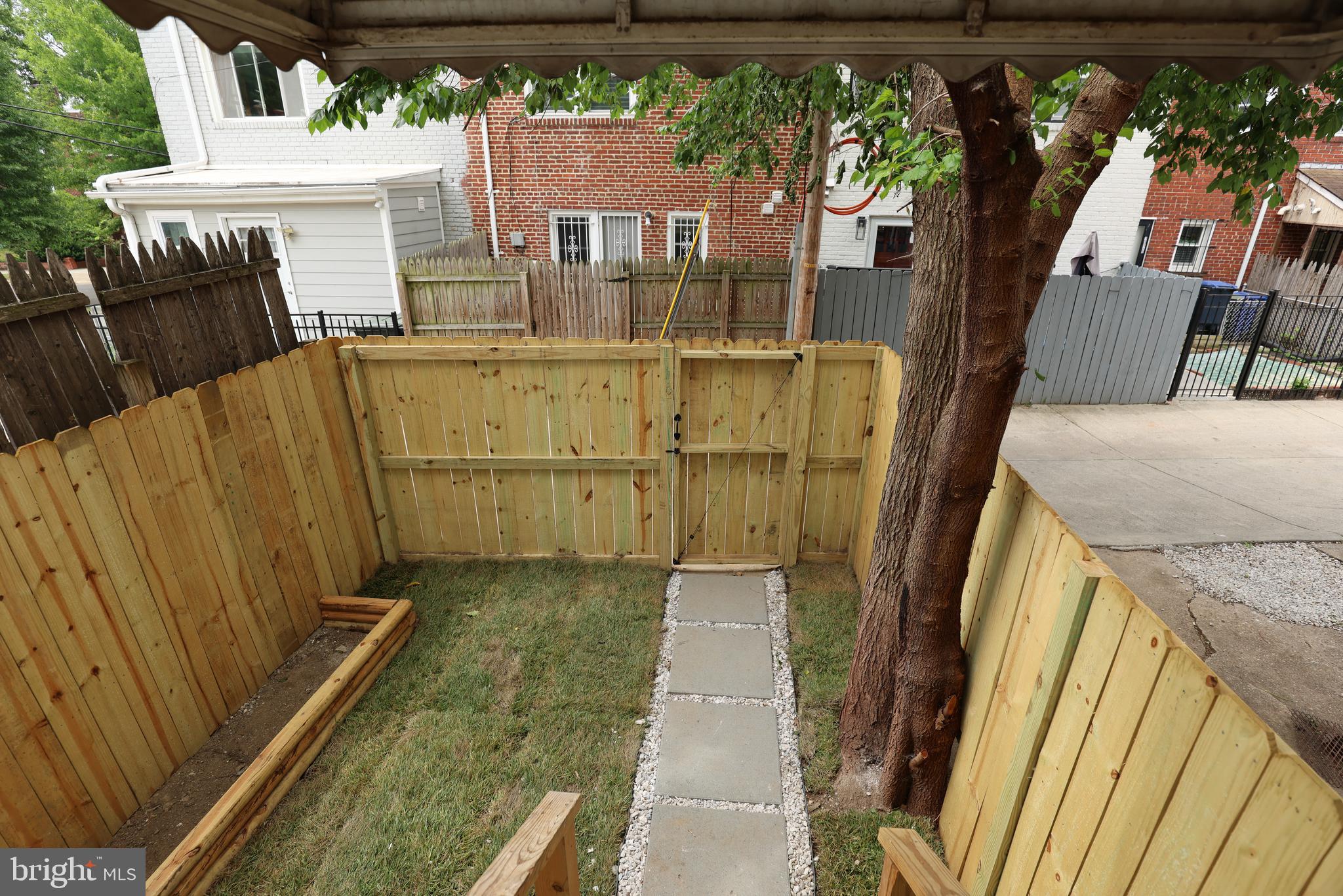 2039 Rosedale Street Northeast Washington, DC 20002 - Photo 18 of 18 a view of a backyard with sitting area