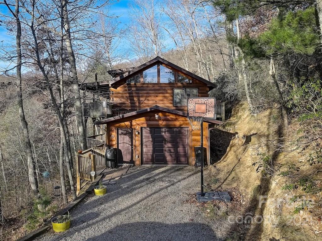 263 Summer Circle Clyde, NC 28721 - Photo 1 of 36 a view of a house with a yard