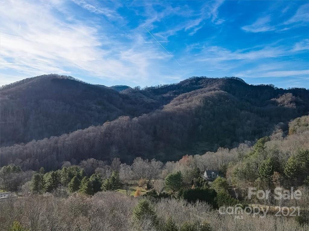 263 Summer Circle Clyde, NC 28721 - Photo 2 of 36 an aerial view of residential house with green space all around