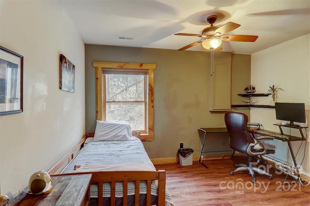 263 Summer Circle Clyde, NC 28721 - Photo 20 of 36 a view of a workspace with furniture and a window