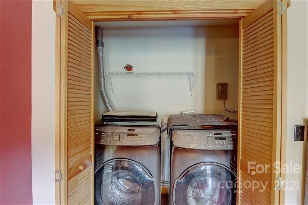 263 Summer Circle Clyde, NC 28721 - Photo 23 of 36 a utility room with dryer and washer
