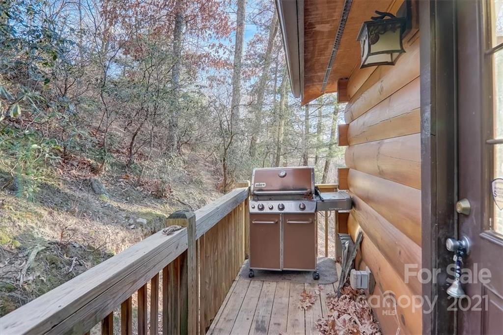 263 Summer Circle Clyde, NC 28721 - Photo 26 of 36 a view of balcony and wooden floor