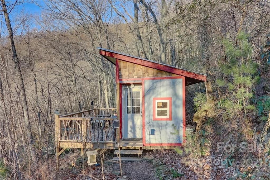263 Summer Circle Clyde, NC 28721 - Photo 29 of 36 a front view of a house with balcony