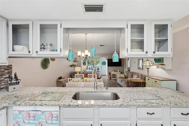 a en suite bathroom with a sink and a mirror