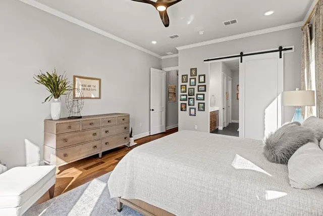 a living room with fireplace furniture and a chandelier