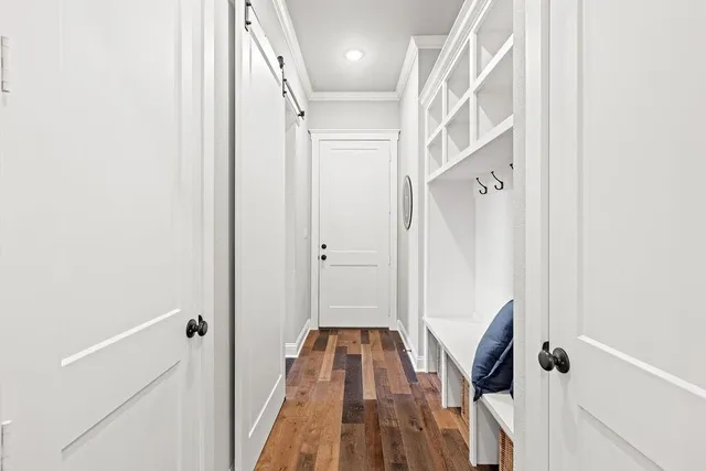 a bedroom with a large bed and a couch