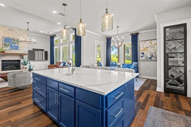 a view of a livingroom with furniture and a garage