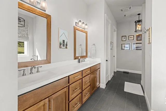 a white bath tub sitting next to a window