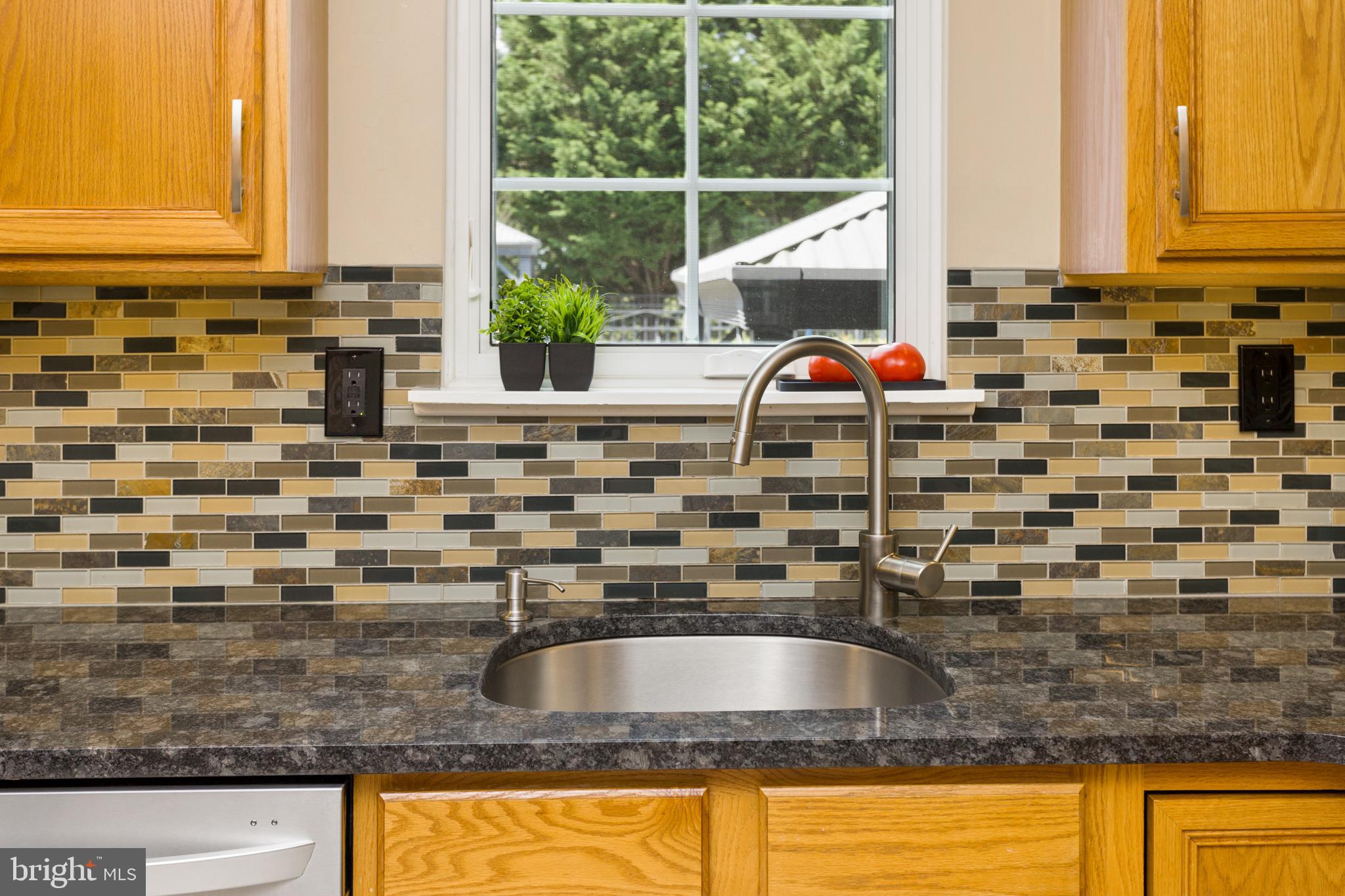 34 Valley Forge Road Bordentown, NJ 08505 - Photo 16 of 56 a view of a kitchen counter top a sink and a window