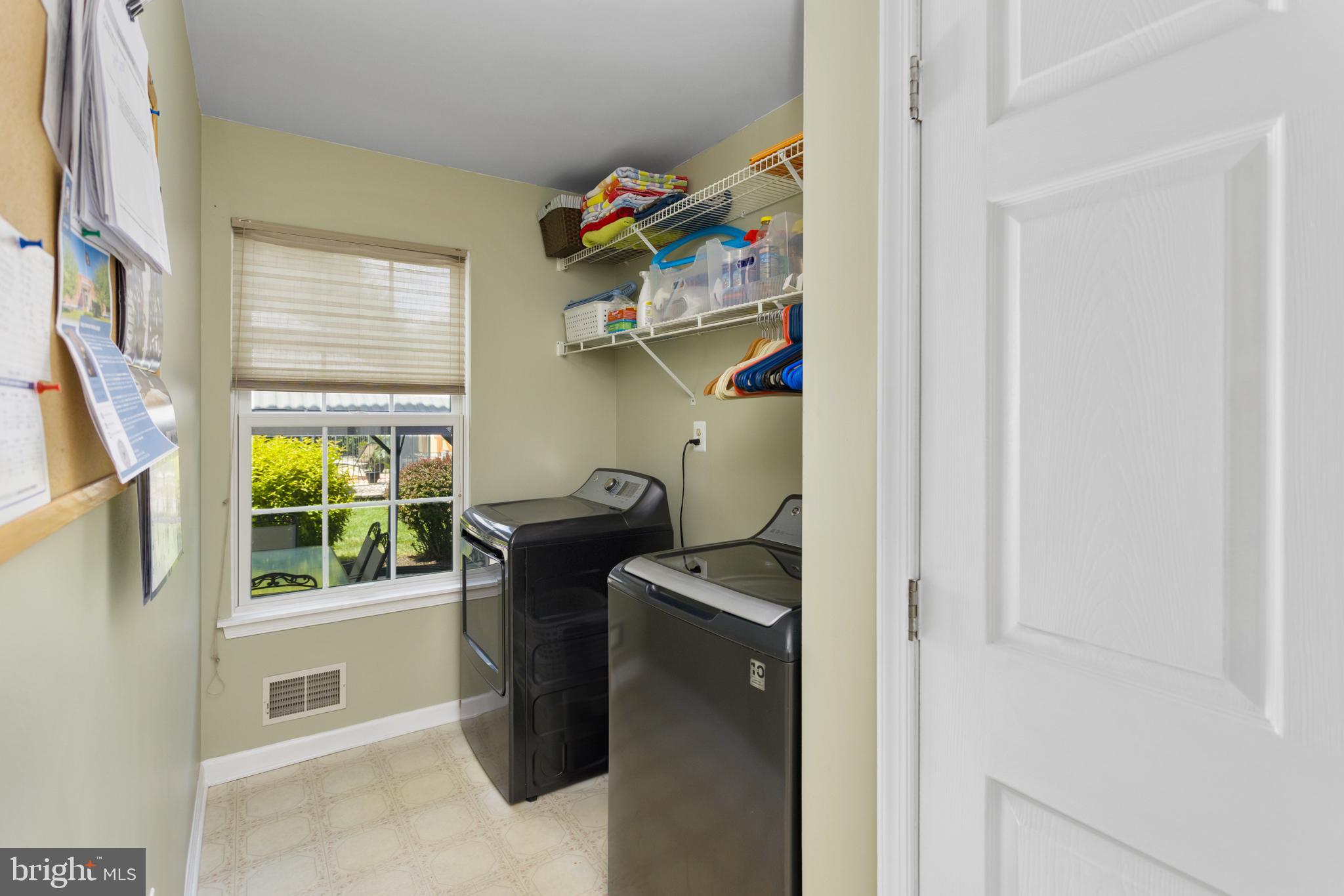 34 Valley Forge Road Bordentown, NJ 08505 - Photo 22 of 56 a utility room with fridge dryer and washer