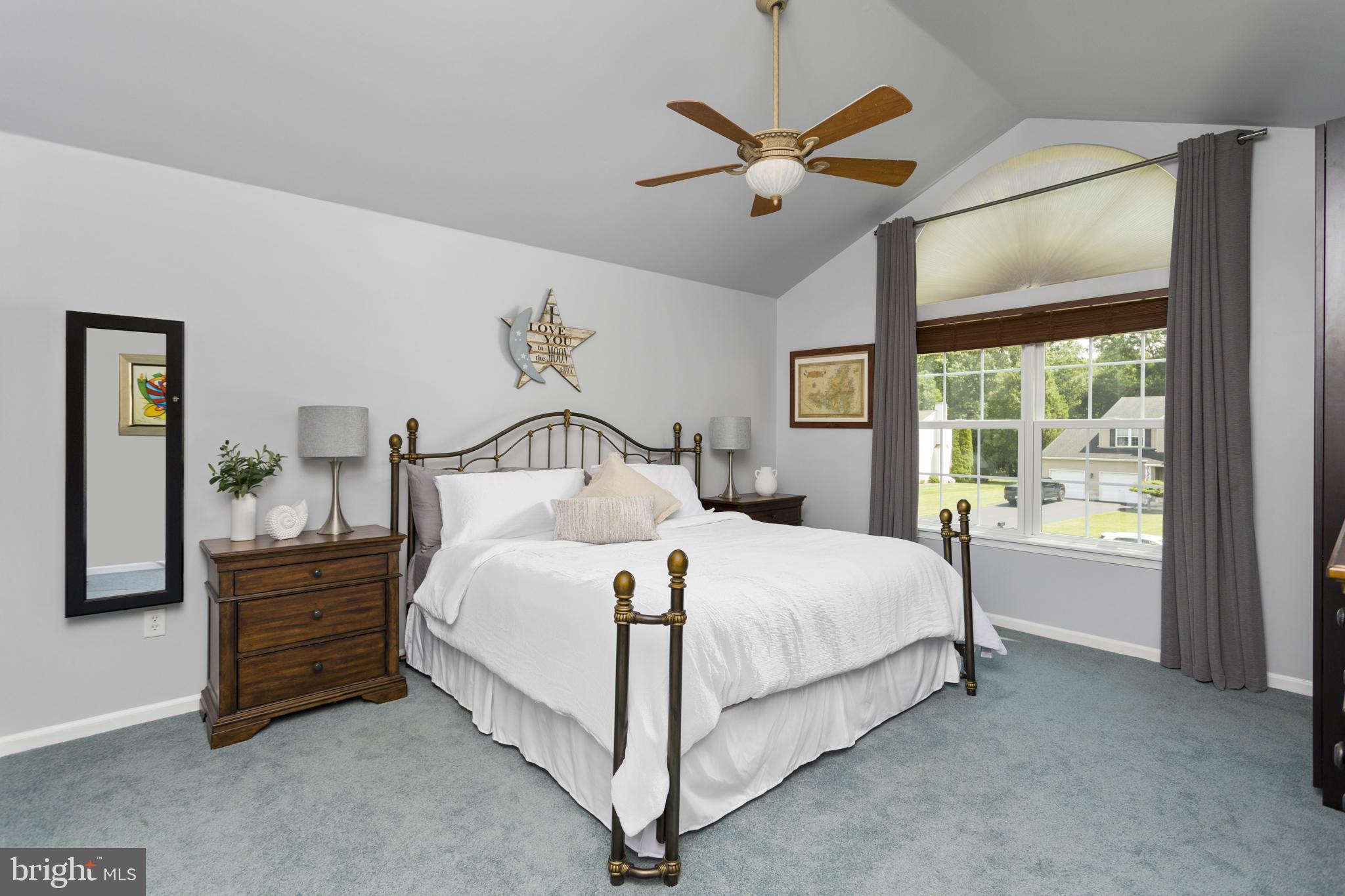 34 Valley Forge Road Bordentown, NJ 08505 - Photo 24 of 56 a bedroom with a bed chandelier and window