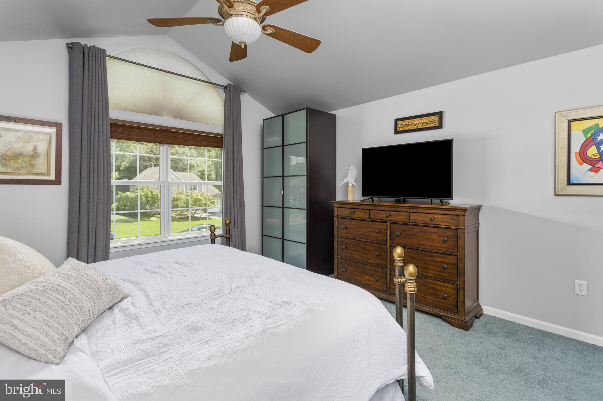 34 Valley Forge Road Bordentown, NJ 08505 - Photo 25 of 56 a bedroom with a bed and a flat screen tv