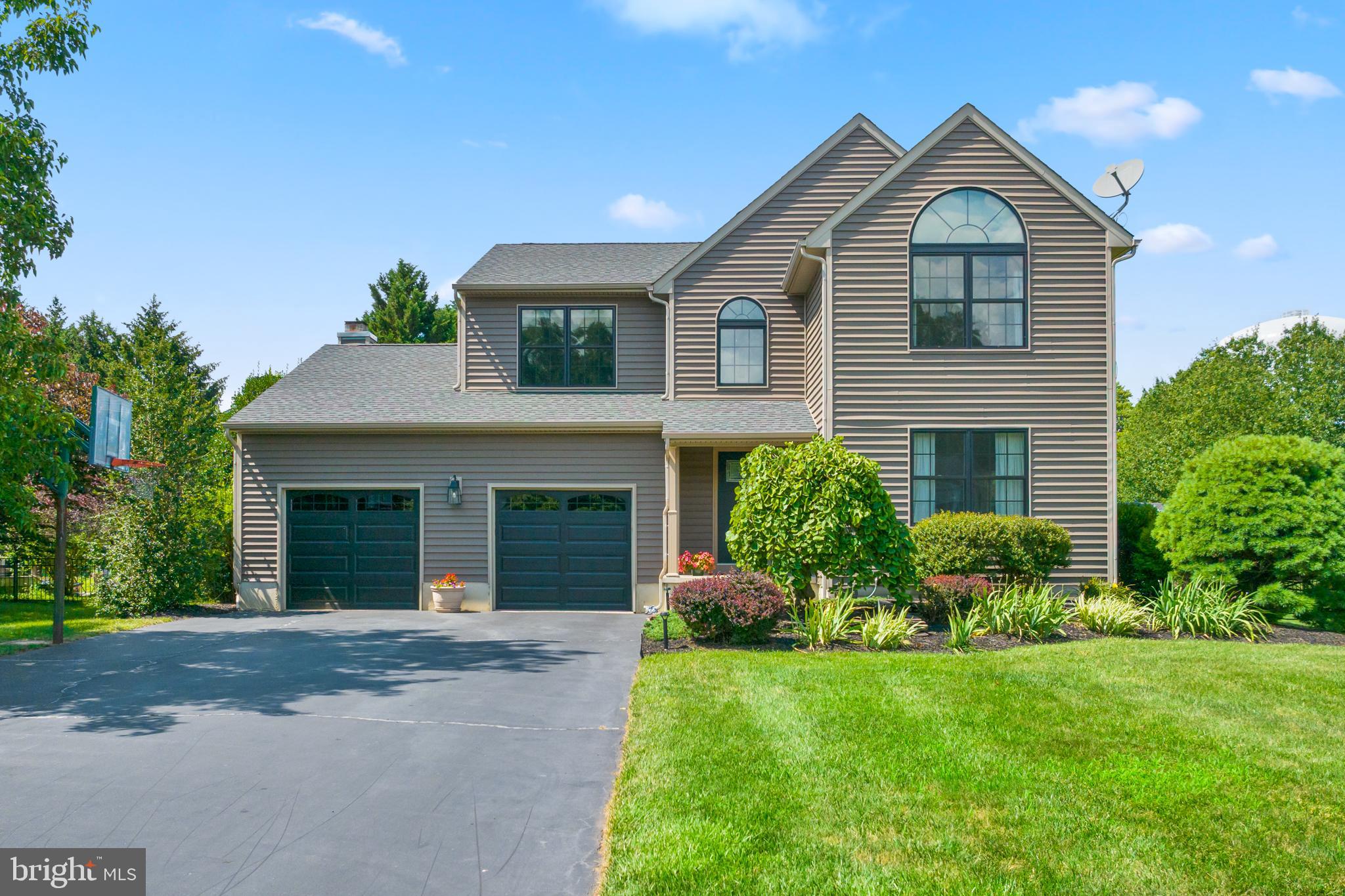 34 Valley Forge Road Bordentown, NJ 08505 - Photo 3 of 56 a front view of a house with a yard and garage